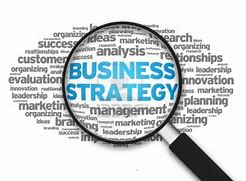 seeing the word business strategy through a magnifying glass